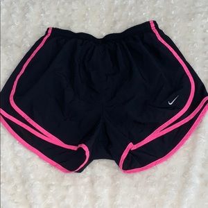 Black and pink Nike shorts